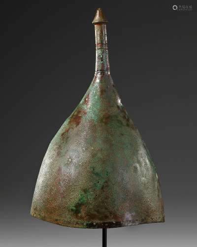 A WESTERN ASIATIC POINTED AND CONICAL BRONZE HELMET, CIRCA 8...