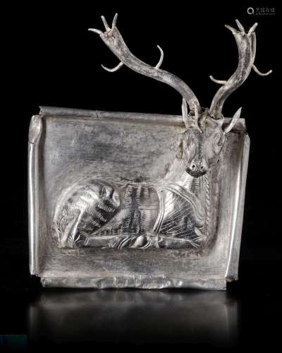 AN ACHAEMENID SILVER PLAQUE WITH SEATED STAG, CIRCA 550-500 ...
