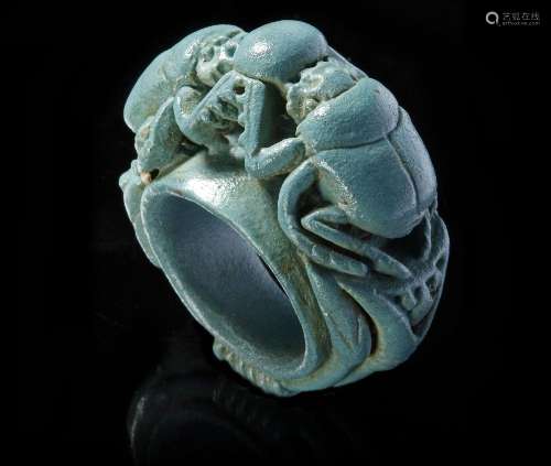 AN EGYPTIAN TURQUOISE FAIENCE RING WITH TWO SCARABS, CIRCA 7...