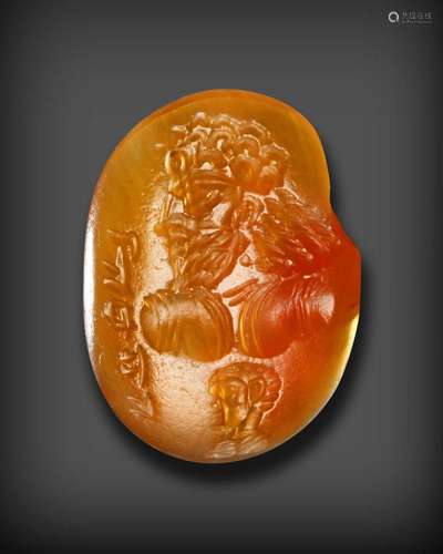 A SASSANIAN CARNELIAN STAMP SEAL WITH PORTRAIT BUST OF A MAN...