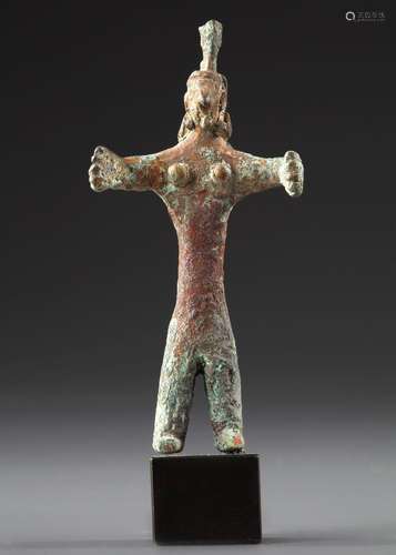 A CANAANITE BRONZE FEMALE FIGURE, CIRCA EARLY 2ND CENTURY B....