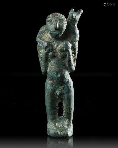 A WESTERN ASIATIC BRONZE STATUETTE OF MAN CARRYING AN ANIMAL...