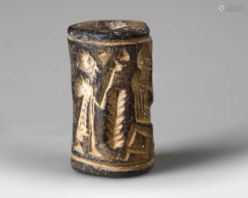 WESTERN ASIATIC GREY STONE CYLINDER SEAL, CIRCA 2ND MILLENNI...