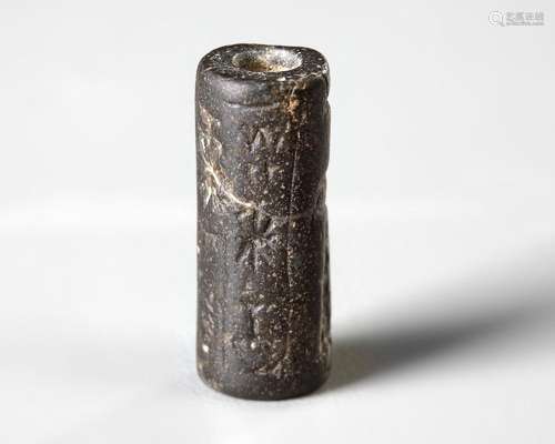 A WESTERN ASIATIC GREY STONE CYLINDER SEAL, CIRCA 1900-1700 ...