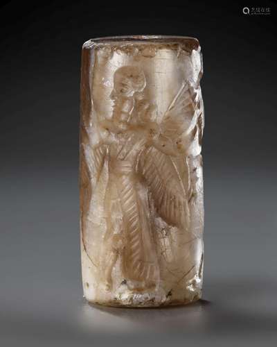 A NEO-BABYLONIAN CYLINDER BANDED AGATE CYLINDER SEAL, CIRCA ...