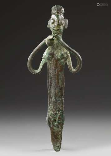 AN ELAMITE BRONZE IDOL, CIRCA 2ND MILLENNIUM B.C.