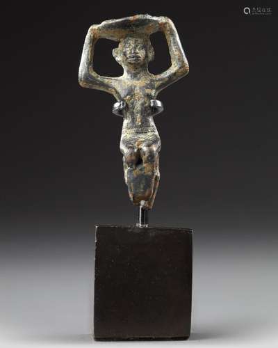 A WESTERN ASIATIC PROTO-ELAMITE STATUETTE, CIRCA 3100-2700 B...