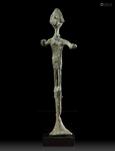 A CANAANITE BRONZE STANDING FIGURE, CIRCA 2ND CENTURY B.C.