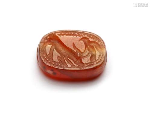 AN EASTERN GREEK CARNELIAN SCARABOID, CIRCA 500 B.C.