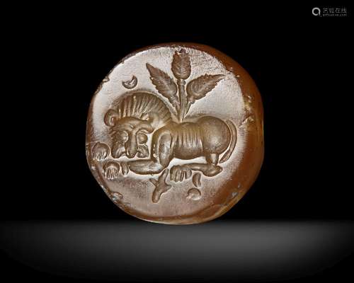 A SASSANIAN AGATE DOMED SEAL OF A CROUCHING LION, CIRCA 5TH ...