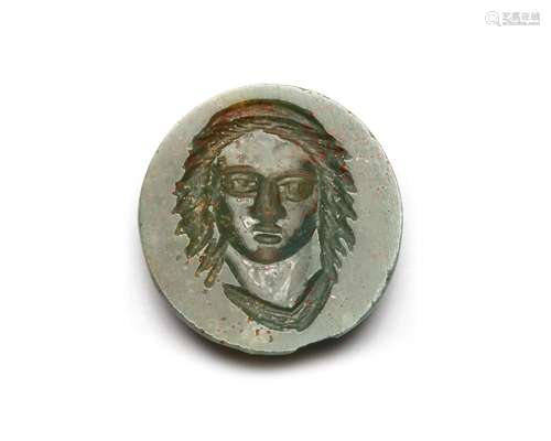 A ROMAN GREEN JASPER INTAGLIO, HEAD OF A MAN, CIRCA 3RD-4TH ...