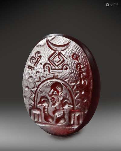 A SASANIAN GARNET INTAGLIO, CIRCA 3RD-5TH CENTURY A.D.