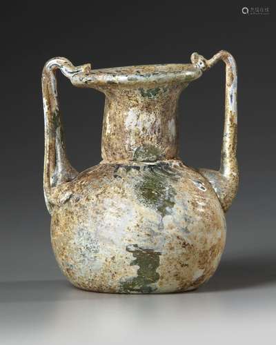 A ROMAN GLASS JAR WITH TWO HANDLES, CIRCA 3RD-4TH CENTURY A....