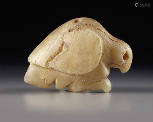 A WESTERN ASIATIC MARBLE SEAL AMULET IN THE FORM OF A BIRD O...