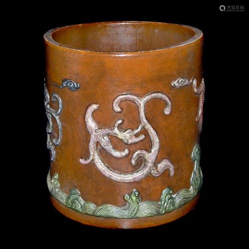 Qing, A Fine Brown Glazed Relief Carved Qilin Brush Pot