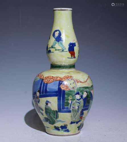 A yellow-ground Wu cai 'figure' gourd-shaped vase,Kang xi Ma...