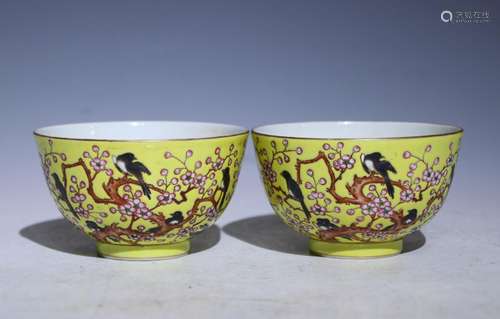 A pair of famille-rose and yellow-ground 'floral and birds' ...