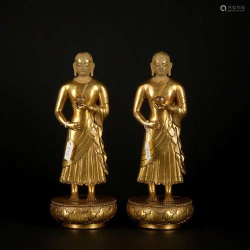 A pair of gilt-bronze statue of Moggallana