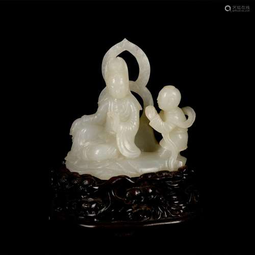 A white statue of Children-Sending Guanyin