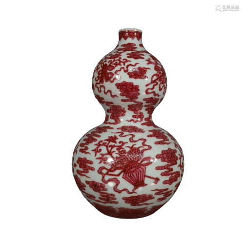 A Delicate Red-Ground Gourd Vase