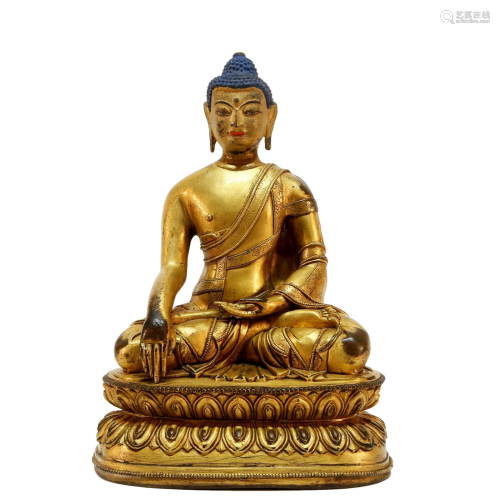 A gilt bronze Sakyamuni statue