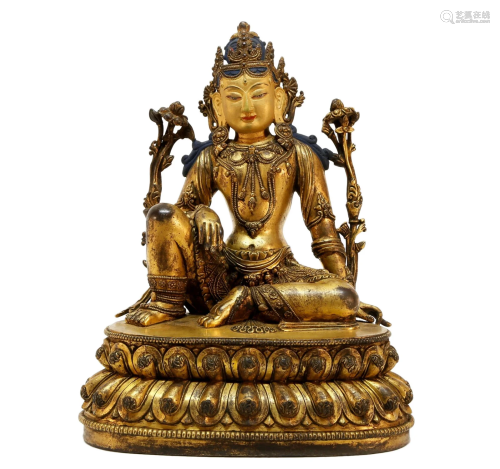 A gilt bronze Guanyin statue