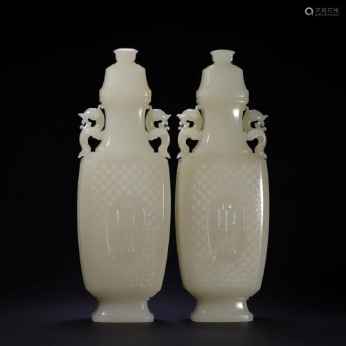 A Pair Of Hetian Jade Phoenix-Handled Vases And Covers