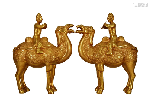 A Pair Of Gilt-Bronze 'Xiongnu Riding Camels' Deco...