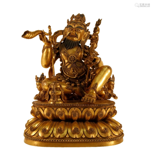 A Gilt-Bronze Figure Of Tibetan Buddha