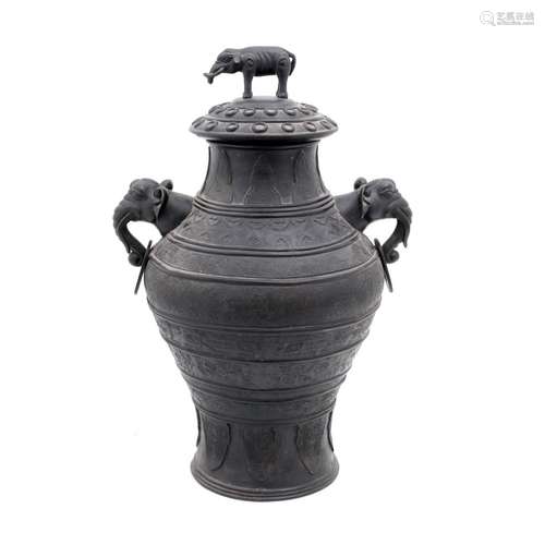 AN ORIENTAL COVERED POT