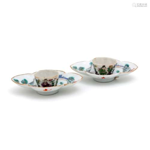 A PAIR OF MINIATURE CUPS AND SAUCERS