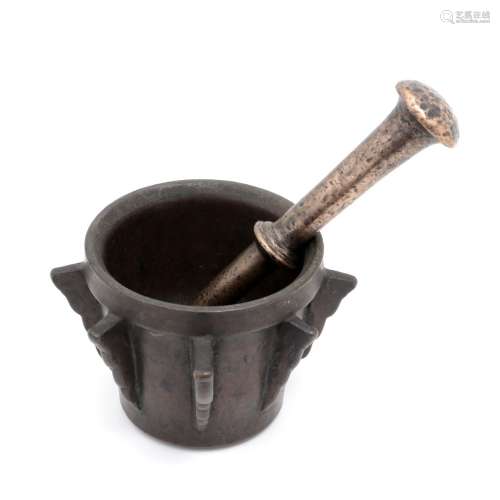 A MORTAR WITH PESTLE