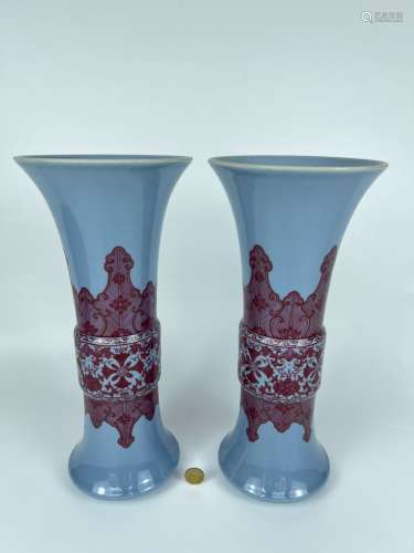 A pair of blue ground famille rose vases, Qing Dynasty Pr.