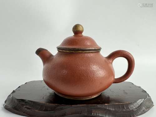 A copper wraped zisha teapot, stamped, Qing Dynasty Pr.