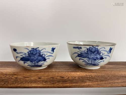 A pair of blue&white cups, one is sliver rim wrapped.