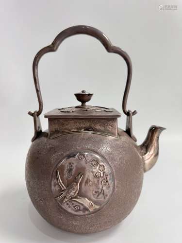 A silver Japanese teapot, stamped.