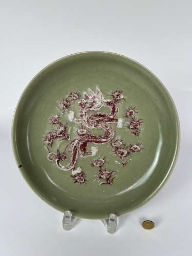 A pale celadon ground underglaze red platter, marked, QianLo...