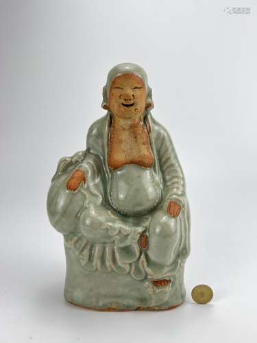 A celadon buddaha figure, Ming Dynasty Pr.