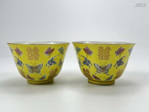 A pair of empire colour ground famille rose cups, marked, Qi...