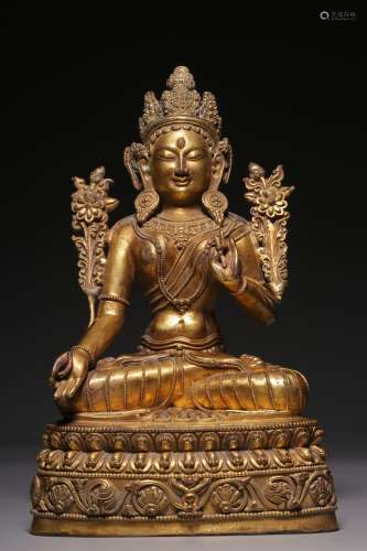 A sitting statue of white Tara with bronze gilt in qing Dyna...