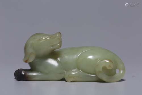 A dog handle with topaz lying in Hetian, Qing Dynasty