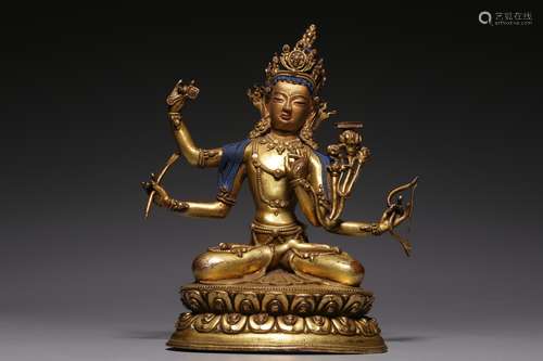 Qing Dynasty, bronze gilt four-arm sitting statue of Guanyin