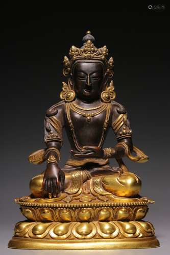 Seated statue of Akshobhya Buddha with copper gilt in Qing D...