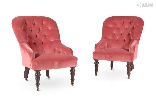 A PAIR OF MAHOGANY AND BUTTON UPHOLSTERED ARMCHAIRS, IN VICT...
