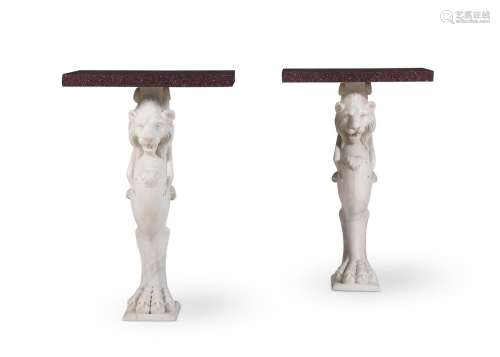 A PAIR OF WHITE MARBLE MONOPODIA CONSOLE TABLES WITH RED POR...