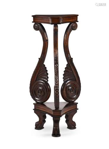 AN ANGLO INDIAN PADOUK TRIFORM PEDESTAL STAND, IN REGENCY ST...
