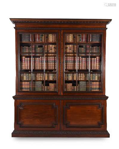 A MAHOGANY LIBRARY BOOKCASE, IN GEORGE II STYLE, OF RECENT M...