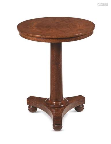 A REGENCY POLLARD OAK PEDESTAL OCCASIONAL TABLE, IN THE MANN...