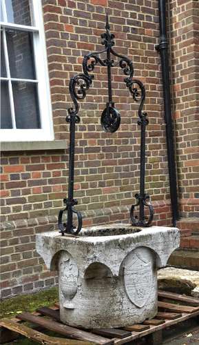 AN ITALIAN CARVED ISTRIAN STONE WELL HEAD, POSSIBLY VENETIAN...