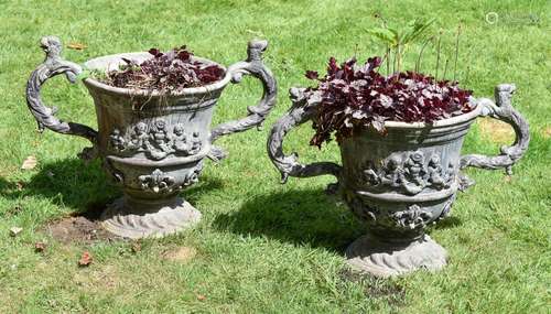 A PAIR OF LEAD TWIN HANDLED URNS, 20TH CENTURY